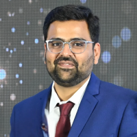 About Us 1 Raman sir with background 1